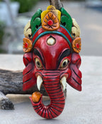 Hand Carved Wooden GANESH Hindu Elephant Deity MASK Handmade in NEPAL Sculptural Wall Hanging Decor Red - DharmaObjects